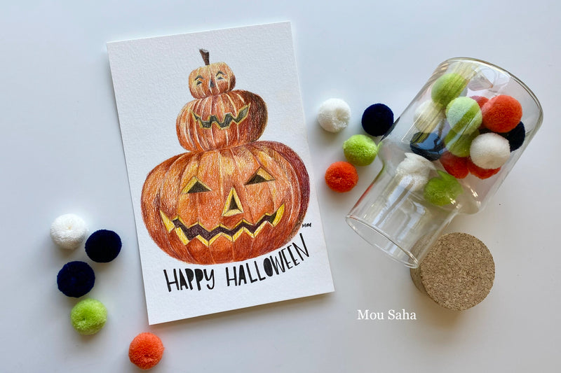 Pumpkins on a Happy Halloween card