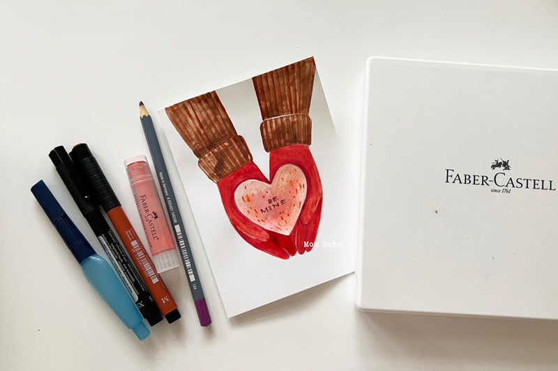 A Valentine's Day card with art materials
