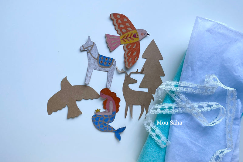 Donkey, bird, and mermaid gift toppers